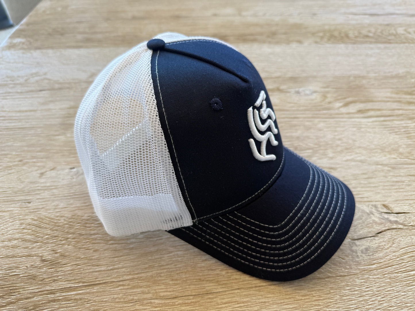 American Reins Puff Embroidery Trucker Hat - Navy + White