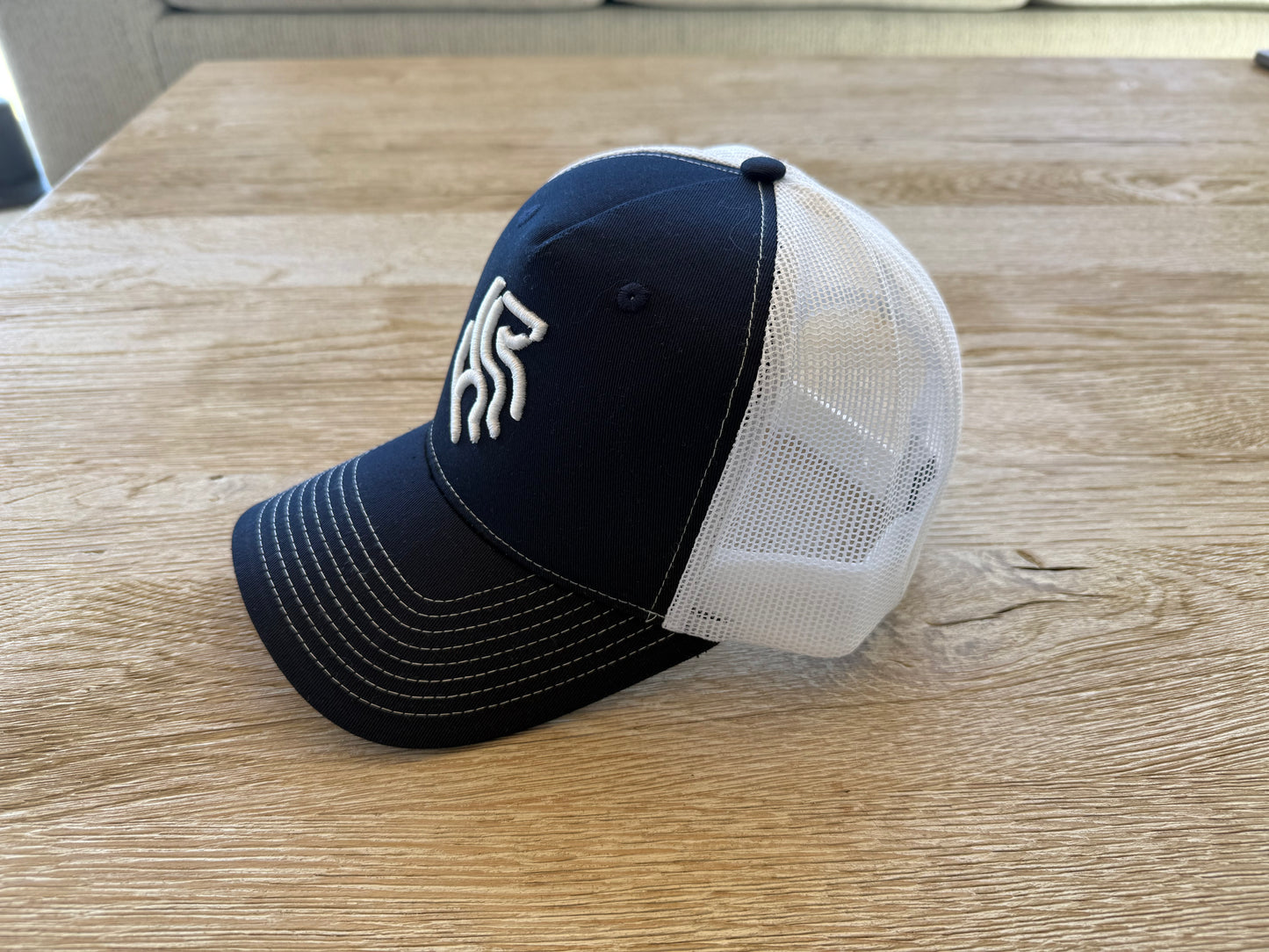 American Reins Puff Embroidery Trucker Hat - Navy + White